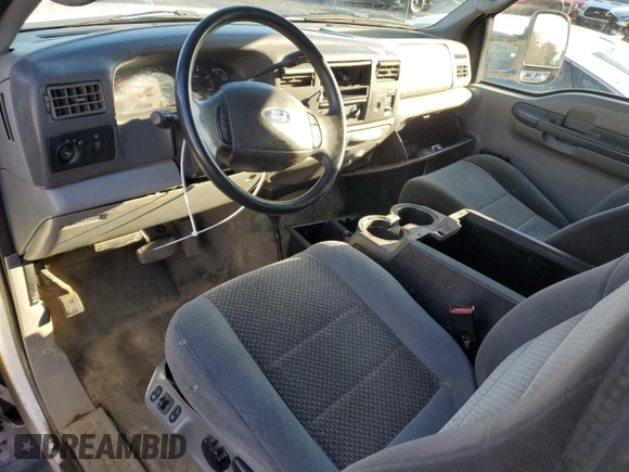 2003 Ford F-350 XL with VIN 1FTSX31P63EB62658, listed as a Copart auction lot 84054284 with 227,705 mi miles and Salvage Title. Bid and sale history available at DreamBid. Image 8.