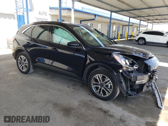 2021 Ford Escape SEL with VIN 1FMCU9H65MUA70490, listed as a Copart auction lot 57815275 with 62,227 mi miles and Salvage title. Bid and sale history available at DreamBid. Image 4.