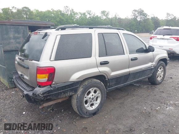 1999 Jeep Grand Cherokee Laredo with VIN 1J4G258SXXC518647, listed as a IAAI auction lot 42124724 with 229,668 mi miles and . Bid and sale history available at DreamBid. Image 4.