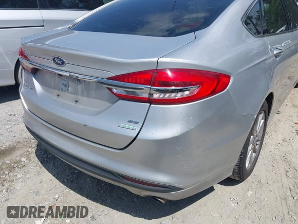 2017 Ford Fusion SE z VIN 3FA6P0HDXHR238713, wystawiony jako IAAI lot #42304140 z przebiegiem 157 630 mil mil oraz . Historia ofert i sprzedaży dostępna na DreamBid. Obrazek 6.