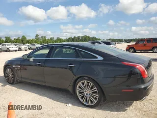 2014 Jaguar XJ with VIN SAJWA2GT0EMV61531, listed as a Copart auction lot 61071054 with 79,266 mi miles and Clean Title. Bid and sale history available at DreamBid. Image 2.