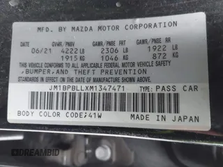 2021 Mazda Mazda3 Hatchback Preferred with VIN JM1BPBLLXM1347471, listed as a IAAI auction lot 41240377 with 68,685 mi miles. Bid and sale history available at carsss.com. Image 9.