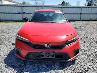 2023 Honda Civic Sport z VIN 2HGFE2F51PH534609, wystawiony jako Copart lot #54923345 z przebiegiem 25 416 mil mil oraz Szkody całkowita. Historia ofert i sprzedaży dostępna na DreamBid. Obrazek 5.