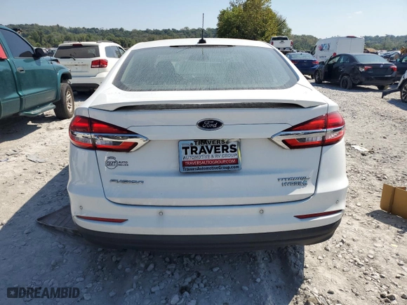 2019 Ford Fusion Hybrid Titanium with VIN 3FA6P0RU5KR277649, listed as a Copart auction lot 69391284 with 90,772 mi miles and Clean Title. Bid and sale history available at carsss.com. Image 6.