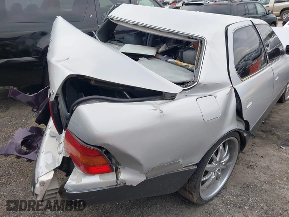 1995 Lexus LS 400 z VIN JT8UF22E9S0029003, wystawiony jako IAAI lot #41595809 z przebiegiem Nie podano mil oraz . Historia ofert i sprzedaży dostępna na DreamBid. Obrazek 13.