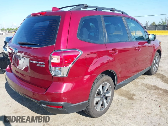 2017 Subaru Forester with VIN JF2SJABC2HH482648, listed as a IAAI auction lot 42140904 with 201,432 mi miles and . Bid and sale history available at DreamBid. Image 4.