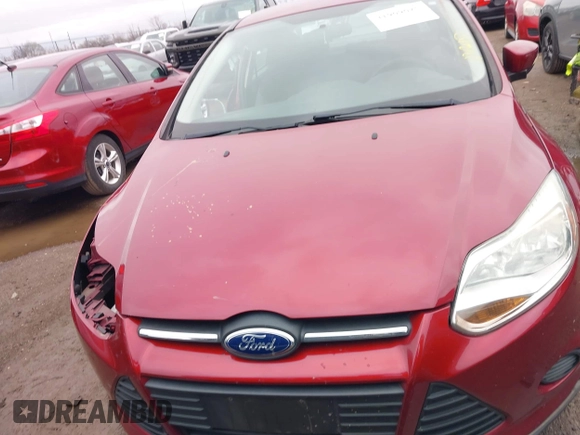 2013 Ford Focus SE z VIN 1FADP3F27DL324354, wystawiony jako IAAI lot #41909025 z przebiegiem 99 096 mil mil oraz . Historia ofert i sprzedaży dostępna na DreamBid. Obrazek 13.