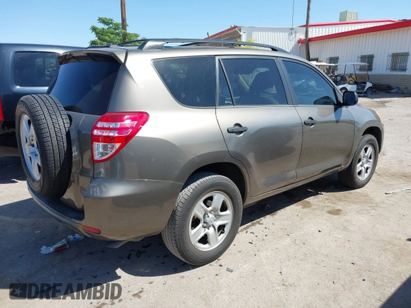 2009 Toyota RAV4 with VIN JTMZF33V69D009256, listed as a IAAI auction lot 41989009 with 142,456 mi miles. Bid and sale history available at carsss.com. Image 4.