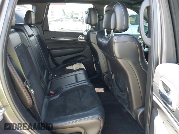 2017 Jeep Grand Cherokee Trailhawk with VIN 1C4RJFLG3HC877110, listed as a IAAI auction lot 42276506 with 144,993 mi miles and . Bid and sale history available at DreamBid. Image 8.