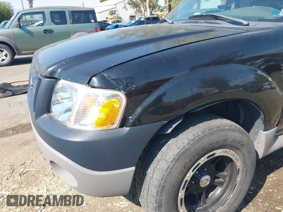 2001 Ford Explorer Sport Trac z VIN 1FMZU77E91UB34713, wystawiony jako IAAI lot #42754266 z przebiegiem 234 203 mil mil oraz . Historia ofert i sprzedaży dostępna na DreamBid. Obrazek 6.