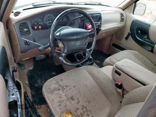 1999 Ford Ranger XL z VIN 1FTYR14VXXPB63891, wystawiony jako Copart lot #58447985 z przebiegiem 449 956 mil mil oraz Szkoda całkowita • Salvage title. Historia ofert i sprzedaży dostępna na DreamBid. Obrazek 8.