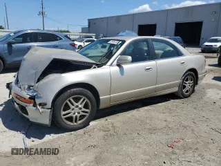 2000 Mazda Millenia with VIN JM1TA2210Y1614967, listed as a Copart auction lot 53606185 with 120,288 mi miles and Salvage Title. Bid and sale history available at DreamBid. Image 1.