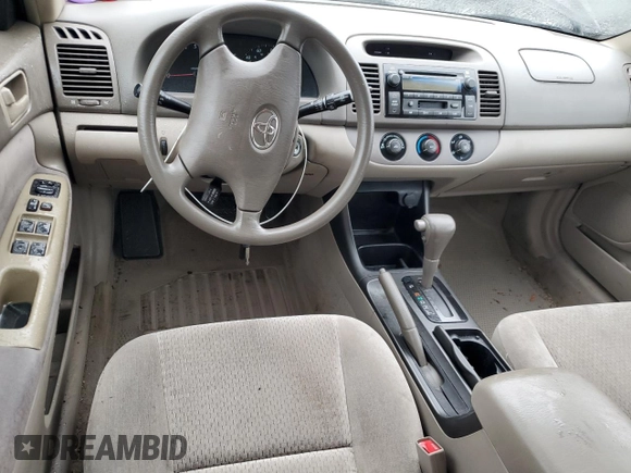 2002 Toyota Camry LE z VIN 4T1BE32K72U510377, wystawiony jako Copart lot #58052175 z przebiegiem 123 339 mil mil oraz Szkoda całkowita • Salvage title. Historia ofert i sprzedaży dostępna na DreamBid. Obrazek 8.