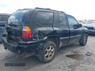 2009 GMC Envoy SLE z VIN 1GKDS33S592105035, wystawiony jako IAAI lot #42089058 z przebiegiem 249 127 mil mil oraz . Historia ofert i sprzedaży dostępna na DreamBid. Obrazek 4.