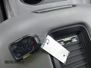 2016 Chevrolet Suburban LT z VIN 1GNSCHKCXGR111027, wystawiony jako IAAI lot #42399887 z przebiegiem 133 970 mil mil oraz . Historia ofert i sprzedaży dostępna na DreamBid. Obrazek 11.