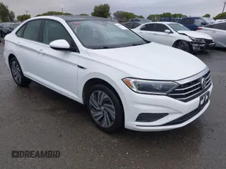 2020 Volkswagen Jetta SEL z VIN 3VWEB7BU3LM038359, wystawiony jako IAAI lot #41487080 z przebiegiem 87 909 mil mil oraz . Historia ofert i sprzedaży dostępna na DreamBid. Obrazek 1.