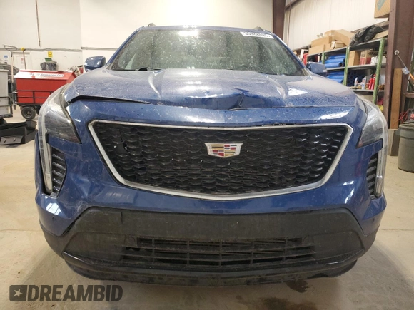 2023 Cadillac XT4 AWD Sport z VIN 1GYFZFR47PF153453, wystawiony jako Copart lot #56988695 z przebiegiem 67 533 mil mil oraz Szkoda całkowita • Salvage title. Historia ofert i sprzedaży dostępna na DreamBid. Obrazek 5.