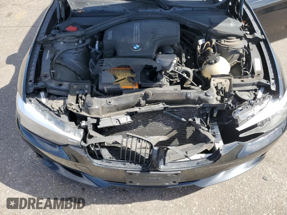 2014 BMW 3 Series 328i xDrive with VIN WBA3B3C58EJ977546, listed as a Copart auction lot 53090185 with 134,823 mi miles and Salvage Title. Bid and sale history available at DreamBid. Image 11.