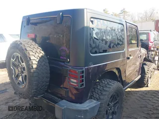 2017 Jeep Wrangler Sport with VIN 1C4AJWAG7HL571463, listed as a IAAI auction lot 41633259 with 130,406 mi miles and . Bid and sale history available at DreamBid. Image 4.