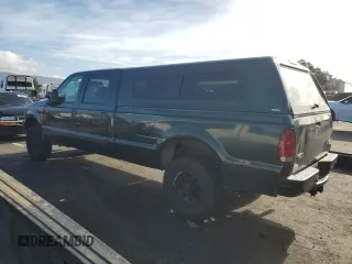 2001 Ford Super Duty F-250 XL with VIN 1FTNW21S21EB56495, listed as a Copart auction lot 85972944 with 142,122 mi miles and Salvage Title. Bid and sale history available at carsss.com. Image 2.