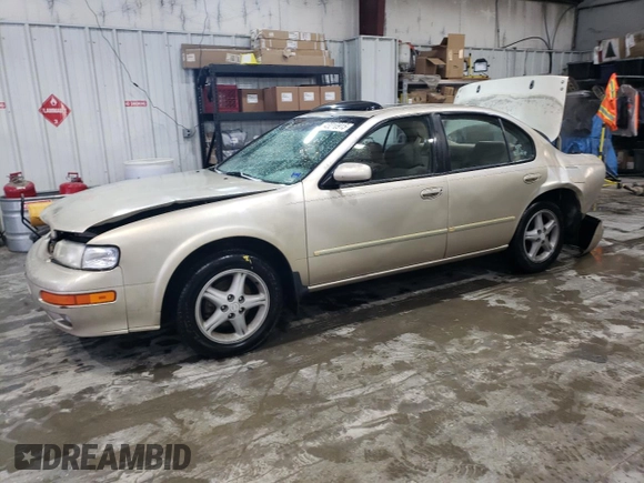 1998 Nissan Maxima GXE with VIN JN1CA21D3WT532196, listed as a Copart auction lot 43210915 with 277,946 mi miles and Salvage title. Bid and sale history available at DreamBid. Image 1.