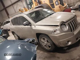 2010 Jeep Compass Sport with VIN 1J4NF4FB7AD501587, listed as a IAAI auction lot 41514419 with 154,826 mi miles. Bid and sale history available at carsss.com. Image 13.