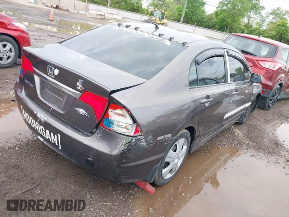 2010 Honda Civic LX with VIN 19XFA1F58AE086425, listed as a IAAI auction lot 42225137 with 186,755 mi miles and . Bid and sale history available at DreamBid. Image 4.