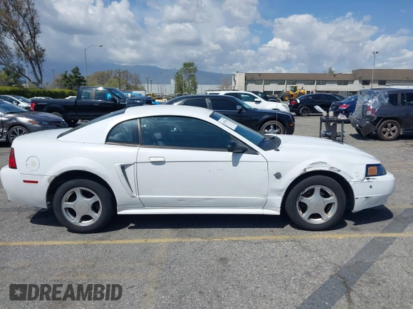2004 Ford Mustang Standard with VIN 1FAFP40674F186503, listed as a IAAI auction lot 41915483 with 157,864 mi miles. Bid and sale history available at carsss.com. Image 13.