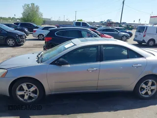 2005 Pontiac G6 GT z VIN 1G2ZH528754171686, wystawiony jako IAAI lot #42241991 z przebiegiem 168 361 mil mil oraz . Historia ofert i sprzedaży dostępna na DreamBid. Obrazek 14.