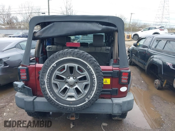 2007 Jeep Wrangler Unlimited Sahara with VIN 1J4GA59177L162022, listed as a IAAI auction lot 41887599 with 207,358 mi miles and . Bid and sale history available at DreamBid. Image 15.