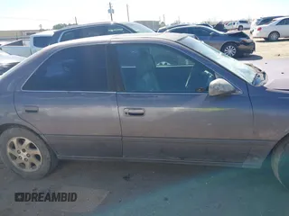 1998 Toyota Camry LE z VIN JT2BF22K6W0117441, wystawiony jako IAAI lot #41720451 z przebiegiem Nie podano mil oraz . Historia ofert i sprzedaży dostępna na DreamBid. Obrazek 13.
