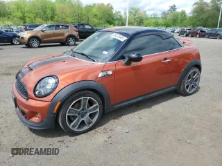 2014 MINI Coupe S z VIN WMWSX3C53ET772881, wystawiony jako Copart lot #56415445 z przebiegiem 76 916 mil mil oraz Czysty tytuł • Clean title. Historia ofert i sprzedaży dostępna na DreamBid. Obrazek 1.