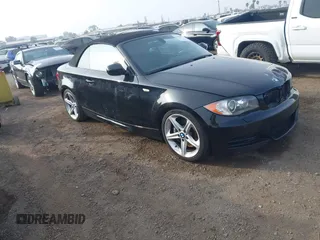 2010 BMW 1 Series 135i with VIN WBAUN9C54AVK41785, listed as a IAAI auction lot 41228825 with 60,817 mi miles and . Bid and sale history available at carsss.com. Image 1.