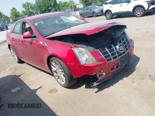 2012 Cadillac CTS Premium z VIN 1G6DS5E34C0132696, wystawiony jako IAAI lot #42562931 z przebiegiem 83 025 mil mil oraz . Historia ofert i sprzedaży dostępna na DreamBid. Obrazek 1.