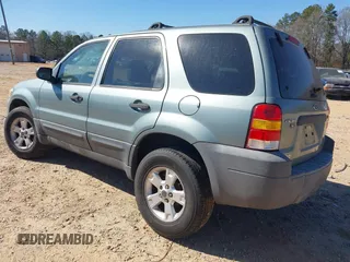 2007 Ford Escape XLT with VIN 1FMCU03137KB28362, listed as a IAAI auction lot 41689766 with 154,345 mi miles and . Bid and sale history available at DreamBid. Image 3.