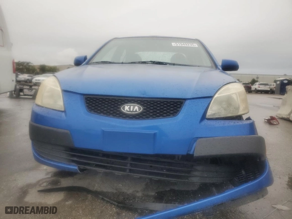 2009 Kia Rio SX with VIN KNADE223896572348, listed as a Copart auction lot 51949235 with 161,546 mi miles and Salvage Title. Bid and sale history available at carsss.com. Image 5.