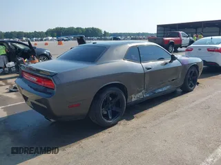 2014 Dodge Challenger R/T с VIN 2C3CDYBT8EH274089, выставлен на аукционе IAAI как лот 42392332 с пробегом 150 254 миль миль и . История ставок и продаж доступна на DreamBid. Изображение 4.