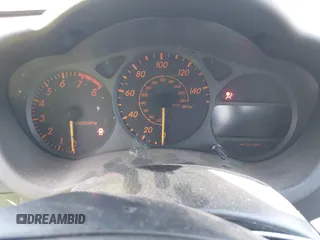 2005 Toyota Celica GT z VIN JTDDR32T950182529, wystawiony jako IAAI lot #42466018 z przebiegiem Nie podano mil oraz . Historia ofert i sprzedaży dostępna na DreamBid. Obrazek 7.
