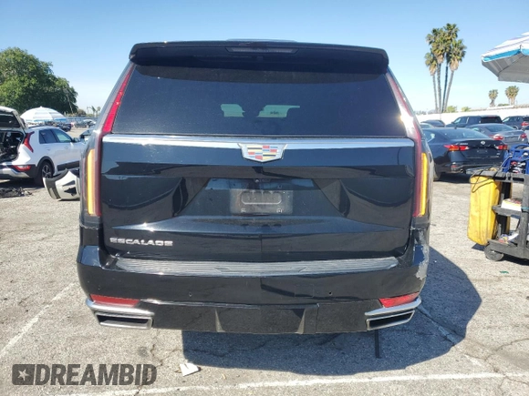 2023 Cadillac Escalade RWD Premium Luxury z VIN 1GYS3BKL4PR395559, wystawiony jako Copart lot #48347285 z przebiegiem 3 818 mil mil oraz Szkoda całkowita • Salvage title. Historia ofert i sprzedaży dostępna na DreamBid. Obrazek 6.