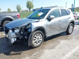 2013 Mazda CX-5 Touring with VIN JM3KE2CE6D0164430, listed as a IAAI auction lot 41961655 with 194,278 mi miles. Bid and sale history available at carsss.com. Image 2.