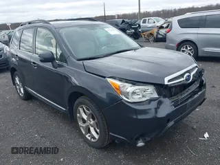 2015 Subaru Forester Touring with VIN JF2SJAWC0FH585722, listed as a IAAI auction lot 41734016 with 90,728 mi miles and . Bid and sale history available at DreamBid. Image 1.