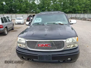 2003 GMC Yukon Denali z VIN 1GKEK63U23J155699, wystawiony jako IAAI lot #42419936 z przebiegiem 197 218 mil mil oraz . Historia ofert i sprzedaży dostępna na DreamBid. Obrazek 6.