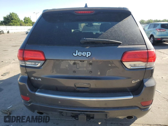 2017 Jeep Grand Cherokee Overland with VIN 1C4RJFCG9HC601806, listed as a Copart auction lot 61786275 with 122,898 mi miles and Salvage title. Bid and sale history available at DreamBid. Image 6.