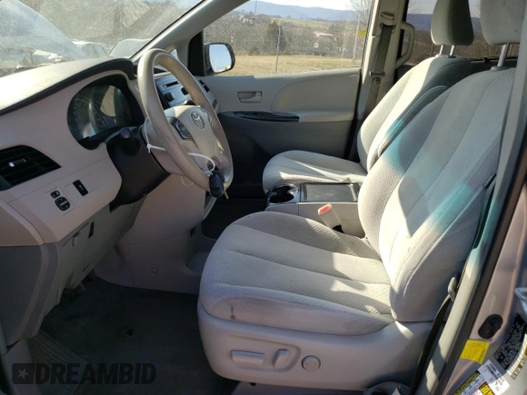 2012 Toyota Sienna LE with VIN 5TDJK3DC1CS031232, listed as a Copart auction lot 48513715 with 214,353 mi miles and Salvage Title. Bid and sale history available at carsss.com. Image 7.