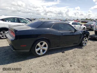 2012 Dodge Challenger SXT Plus with VIN 2C3CDYAG8CH173961, listed as a Copart auction lot 50959275 with 136,639 mi miles and Salvage Title. Bid and sale history available at carsss.com. Image 3.