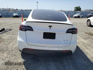 2022 Tesla Model Y Long Range z VIN 7SAYGAEE6NF492070, wystawiony jako Copart lot #52032415 z przebiegiem 143 732 mil mil oraz Szkody całkowita. Historia ofert i sprzedaży dostępna na DreamBid. Obrazek 6.