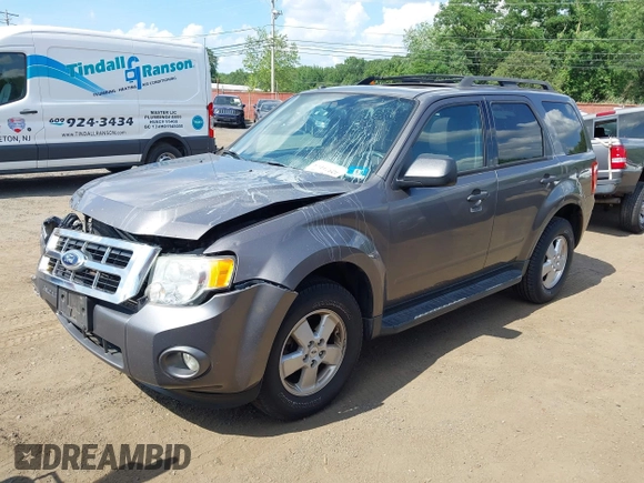 2012 Ford Escape XLT with VIN 1FMCU9D75CKC22907, listed as a IAAI auction lot 42571195 with 198,537 mi miles and . Bid and sale history available at DreamBid. Image 2.