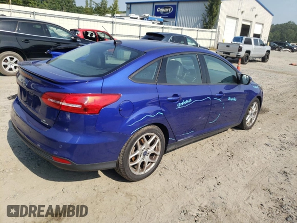 2015 Ford Focus SE with VIN 1FADP3F2XFL299193, listed as a Copart auction lot 59744715 with 141,317 mi miles and Salvage title. Bid and sale history available at DreamBid. Image 3.