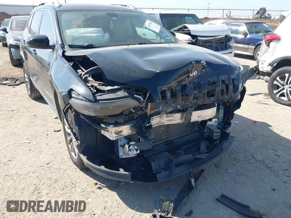2019 Jeep Cherokee Latitude Plus with VIN 1C4PJLLB4KD312411, listed as a IAAI auction lot 41677041 with 82,802 mi miles and . Bid and sale history available at DreamBid. Image 6.