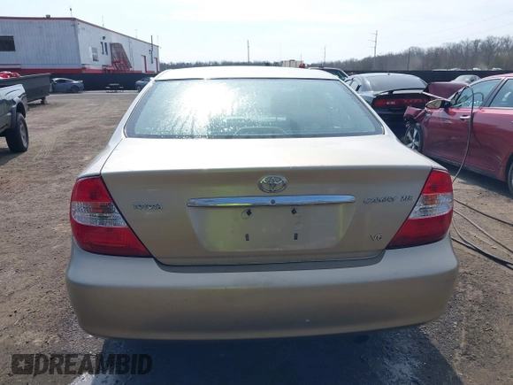 2004 Toyota Camry LE with VIN 4T1BF30K94U587836, listed as a IAAI auction lot 41714277 with 211,893 mi miles and . Bid and sale history available at carsss.com. Image 16.